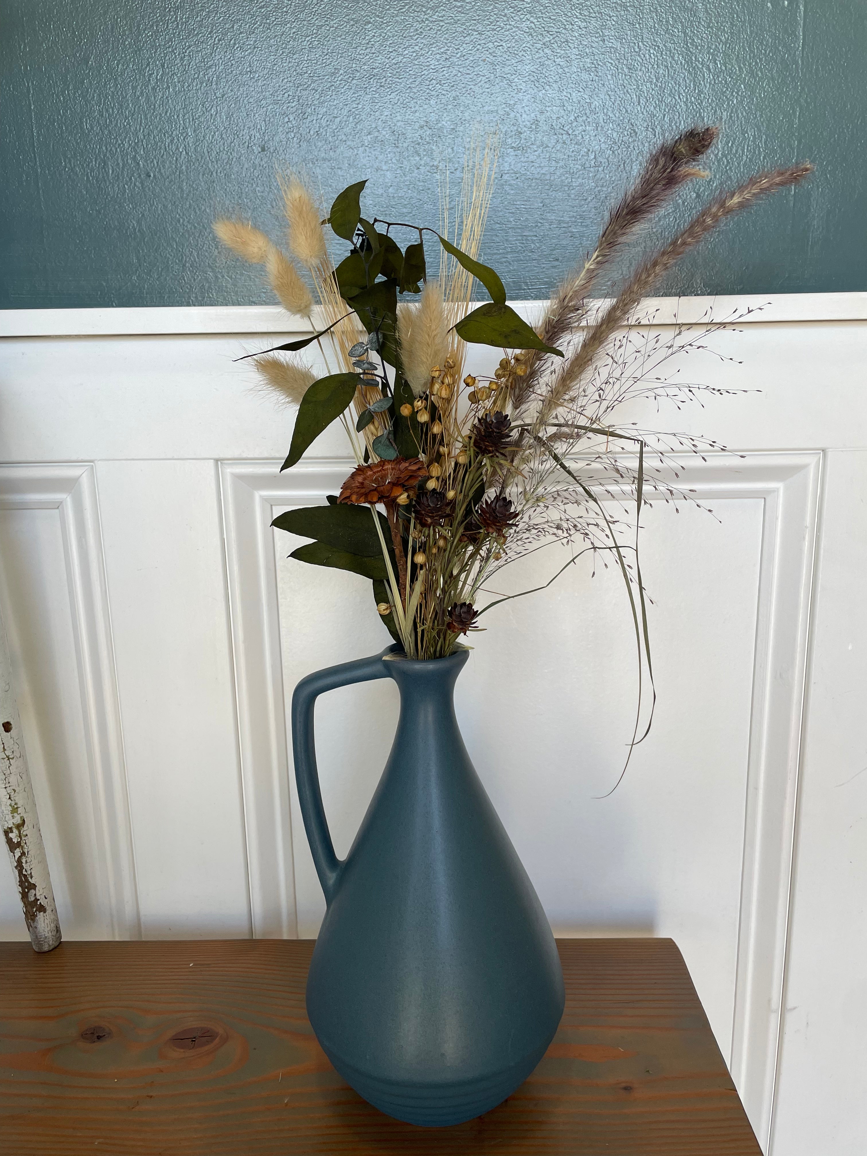 Dried Flowers in Blue Vase
