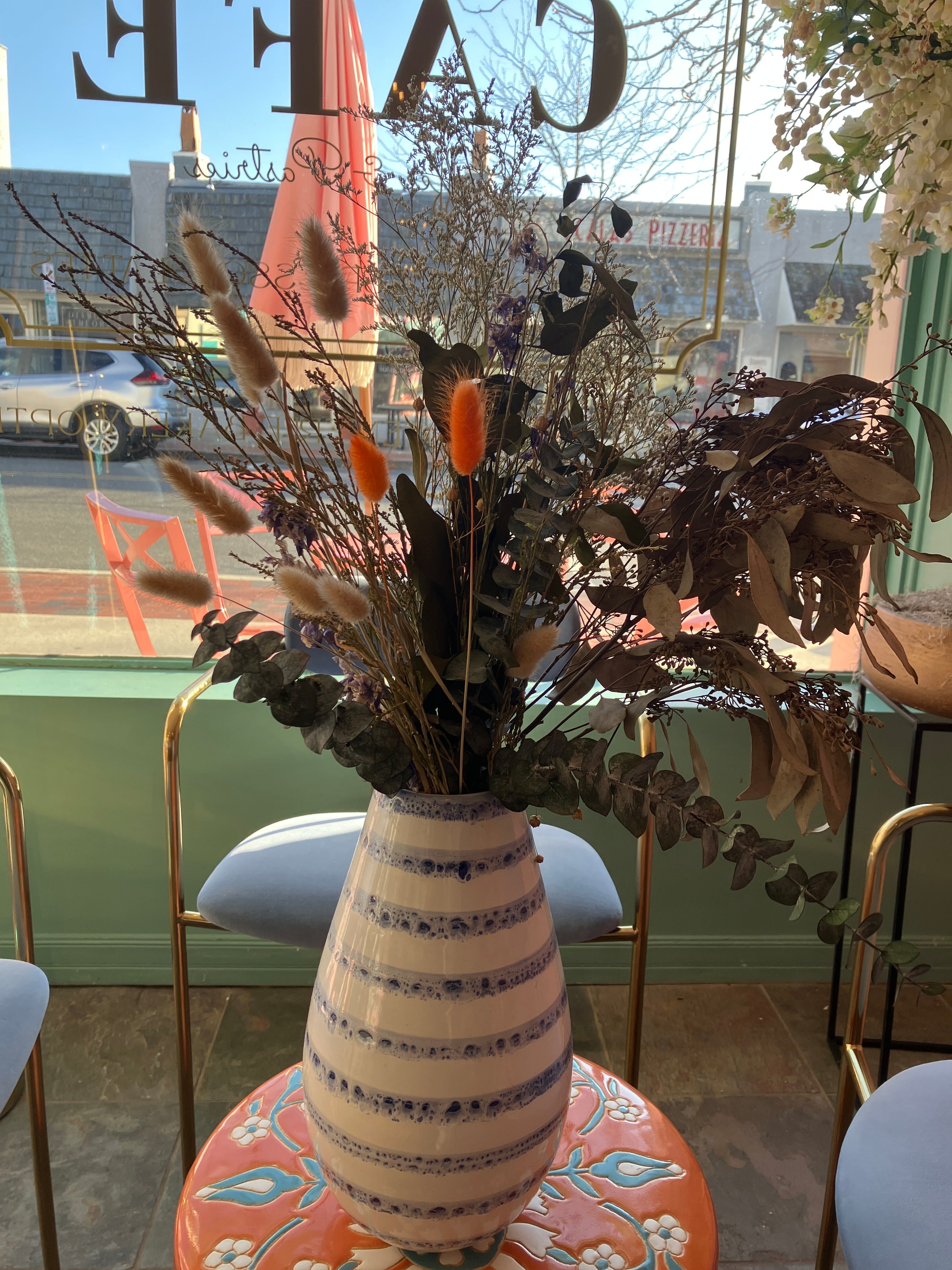 Dried Flowers in Blue Striped White Vase