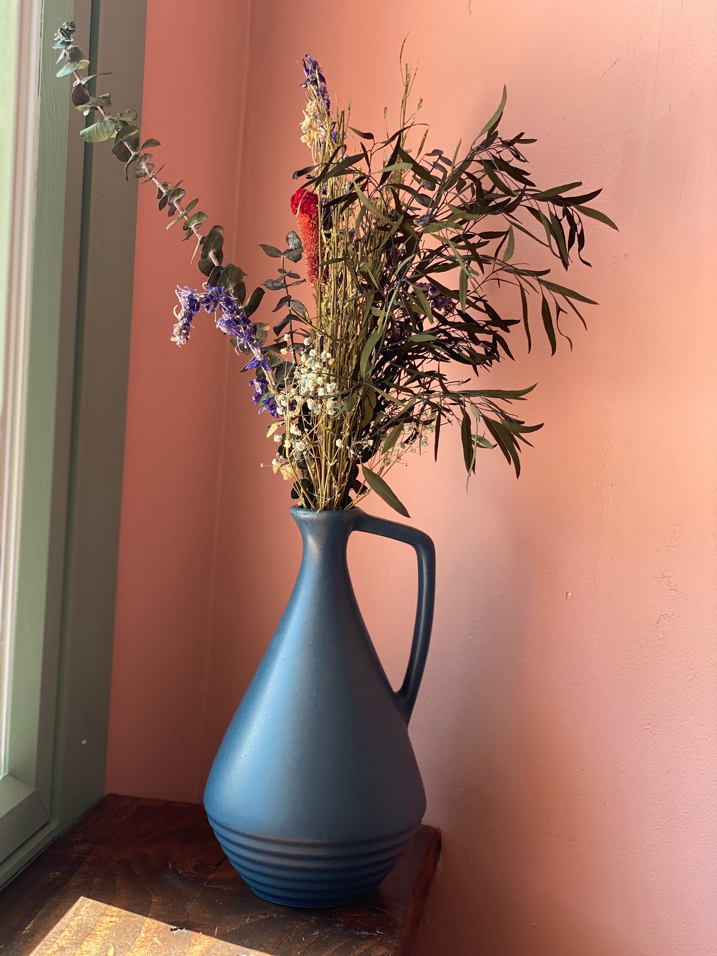 Dried Flowers in Blue Vase