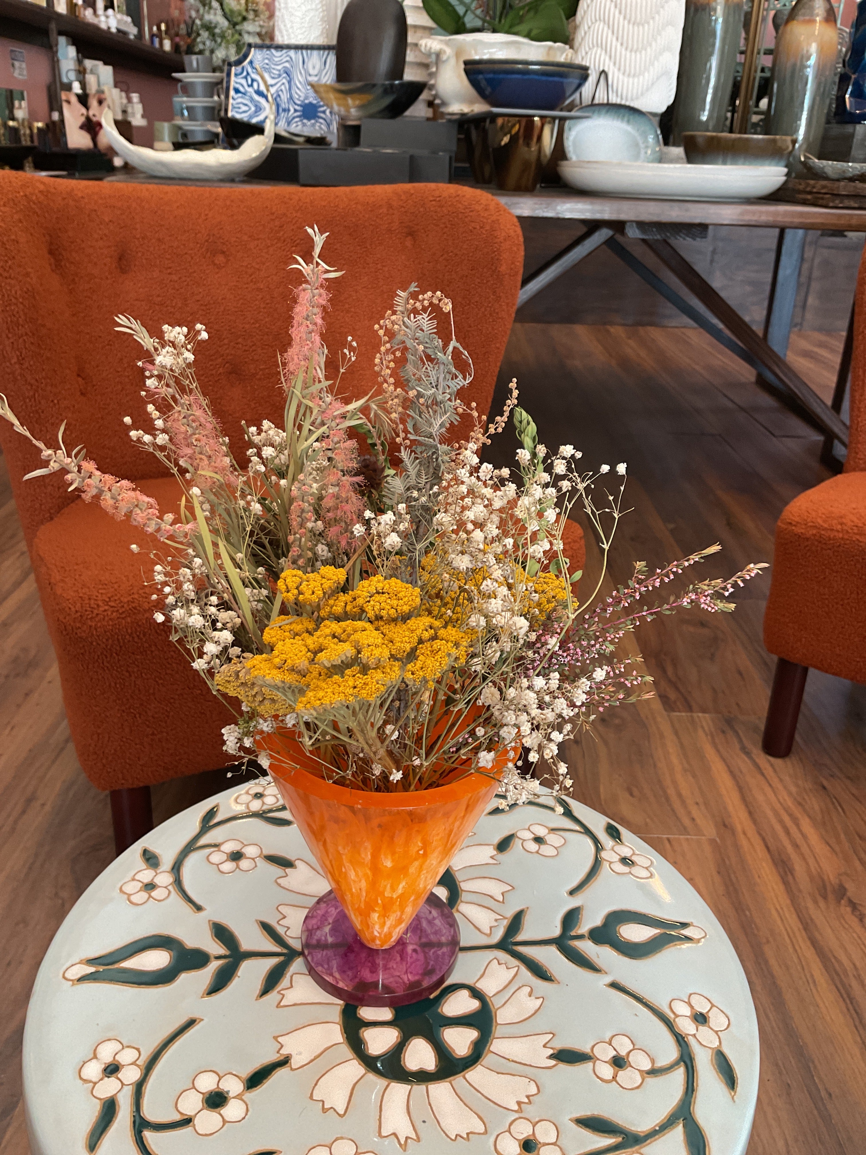 Dried Flowers in Orange Resin Vase