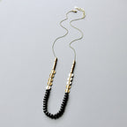 JLT130 black and brass long necklace