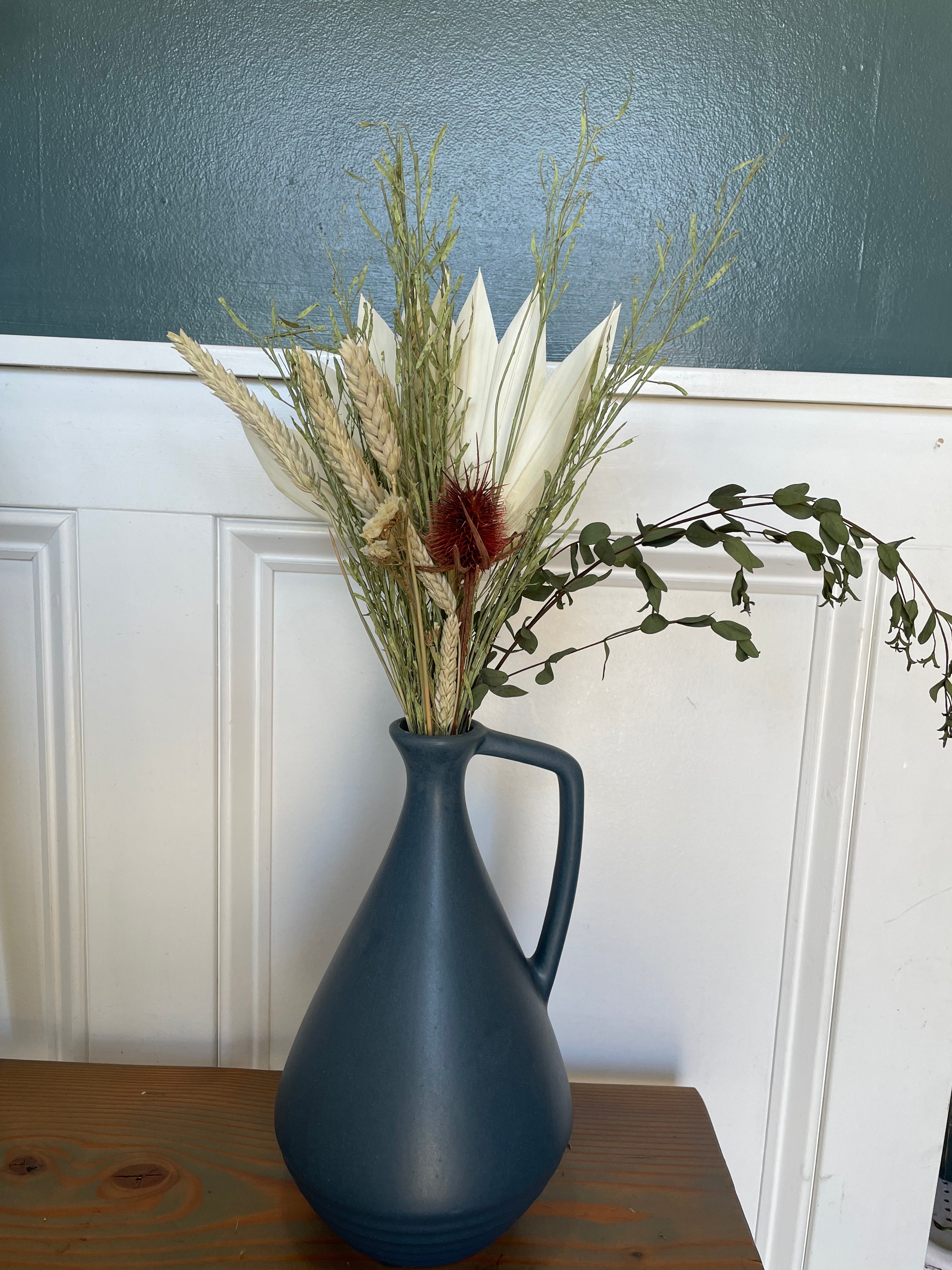 Dried Flowers in Blue Vase