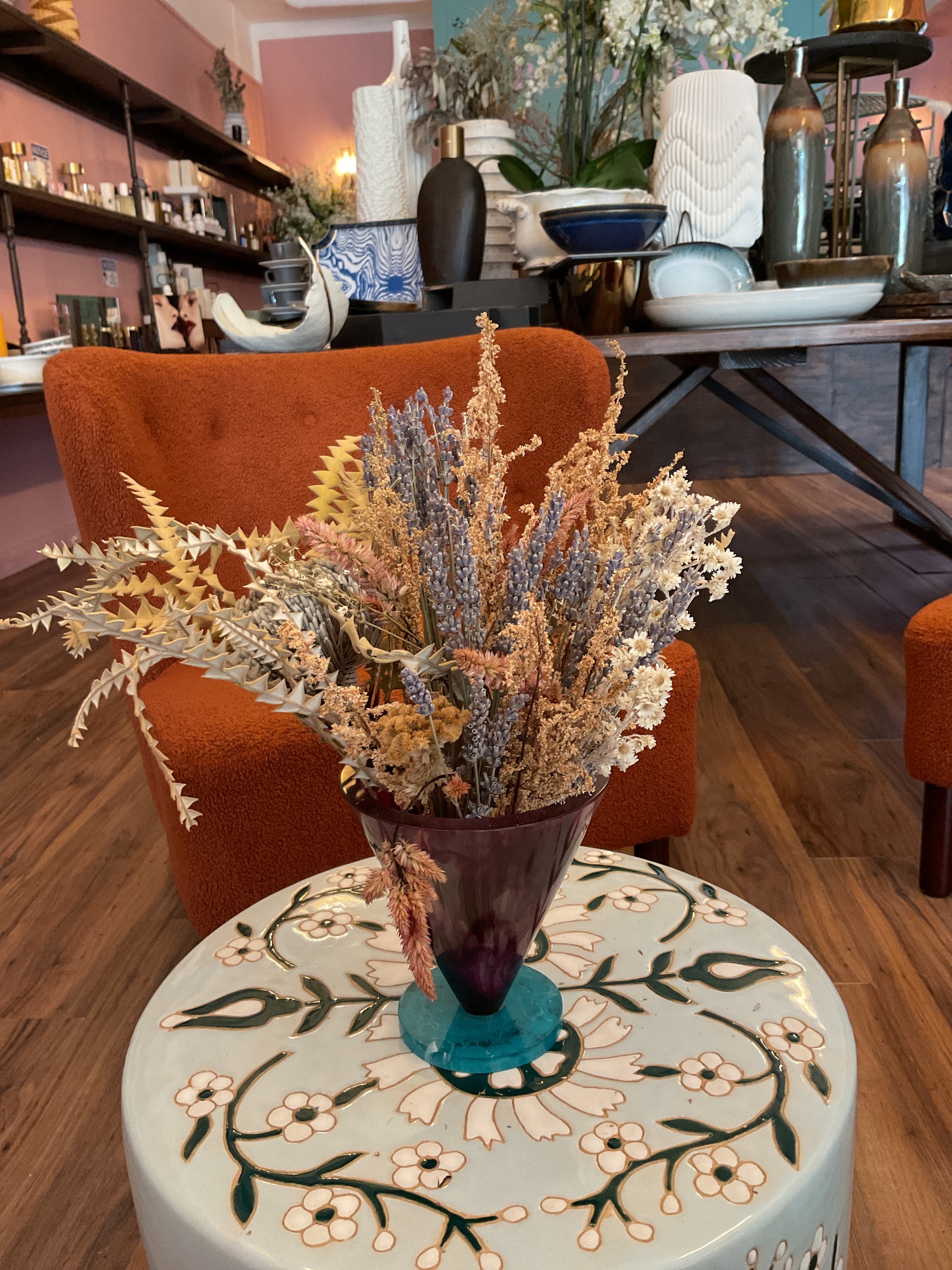 Dried Flowers in Purple Resin Vase