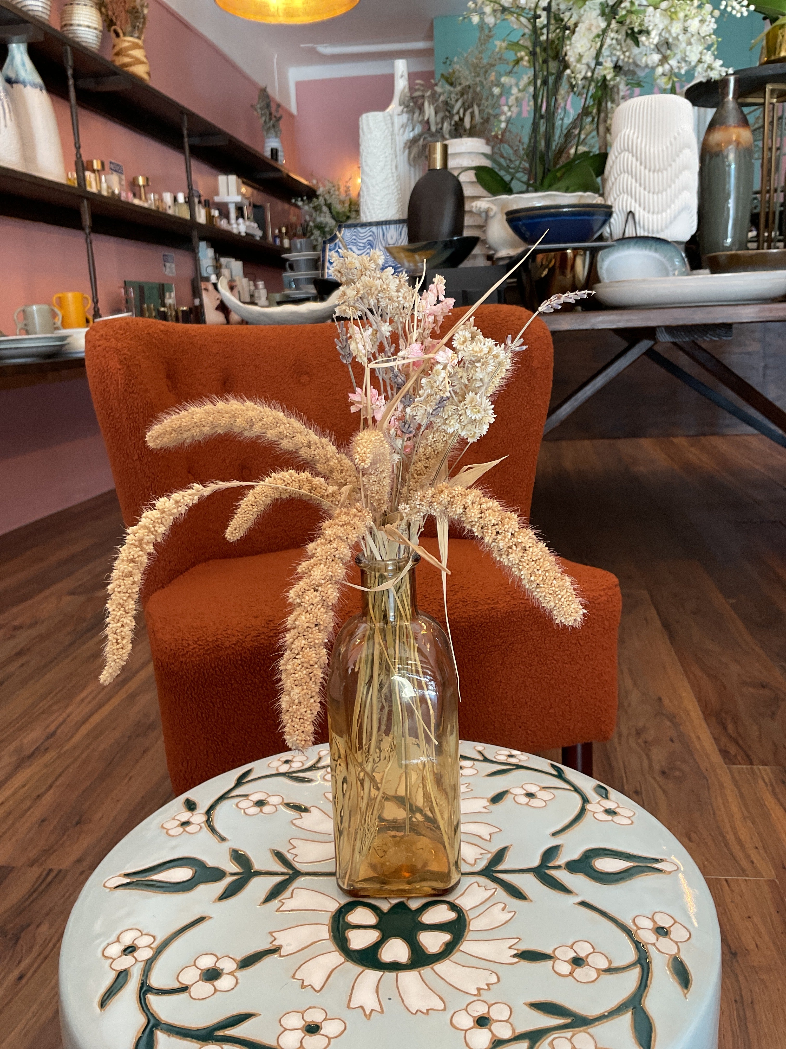 Dried Flowers in Amber Vase