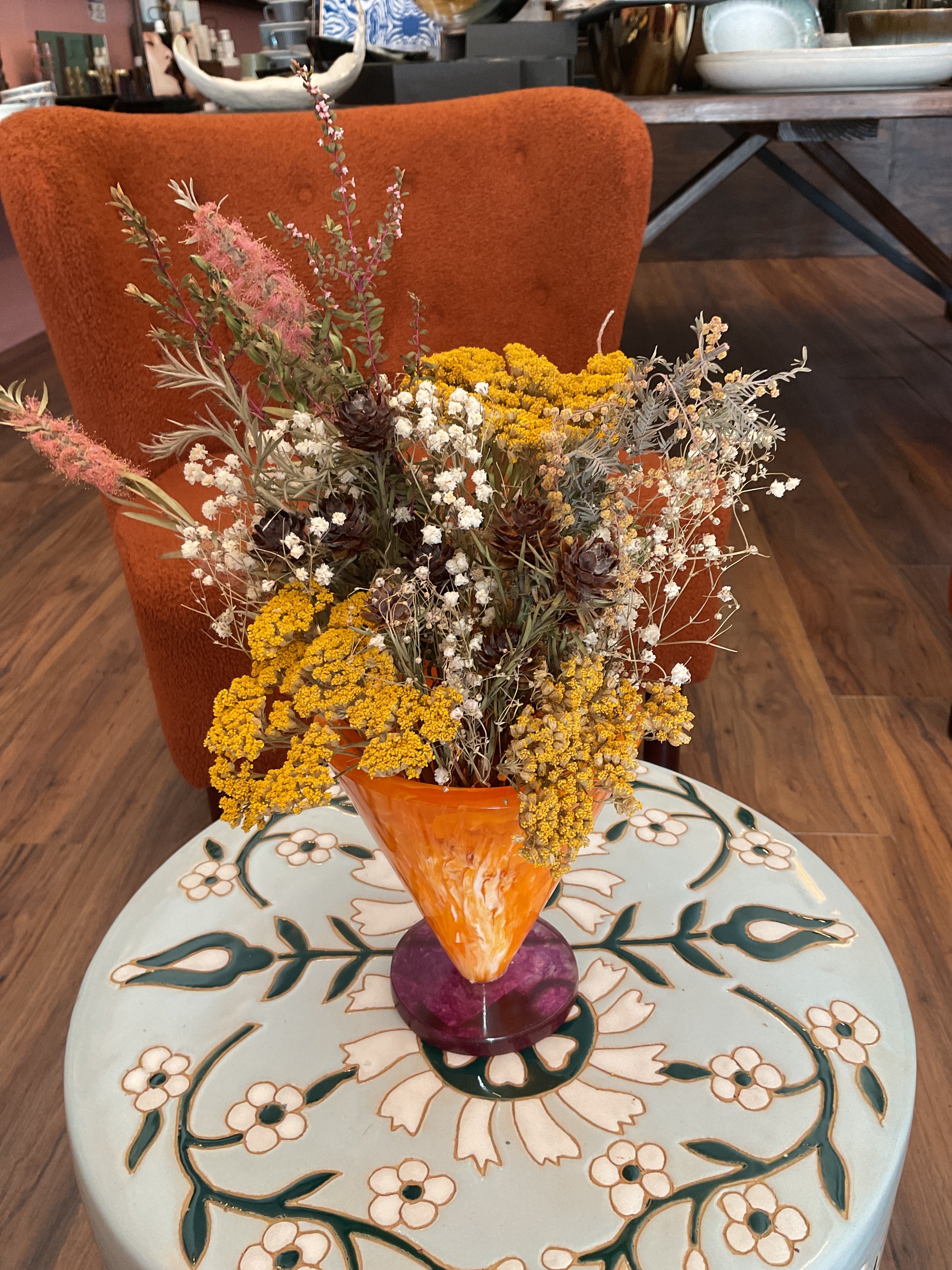 Dried Flowers in Orange Resin Vase