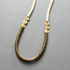 ISL126 Gold hematite and white disc necklace