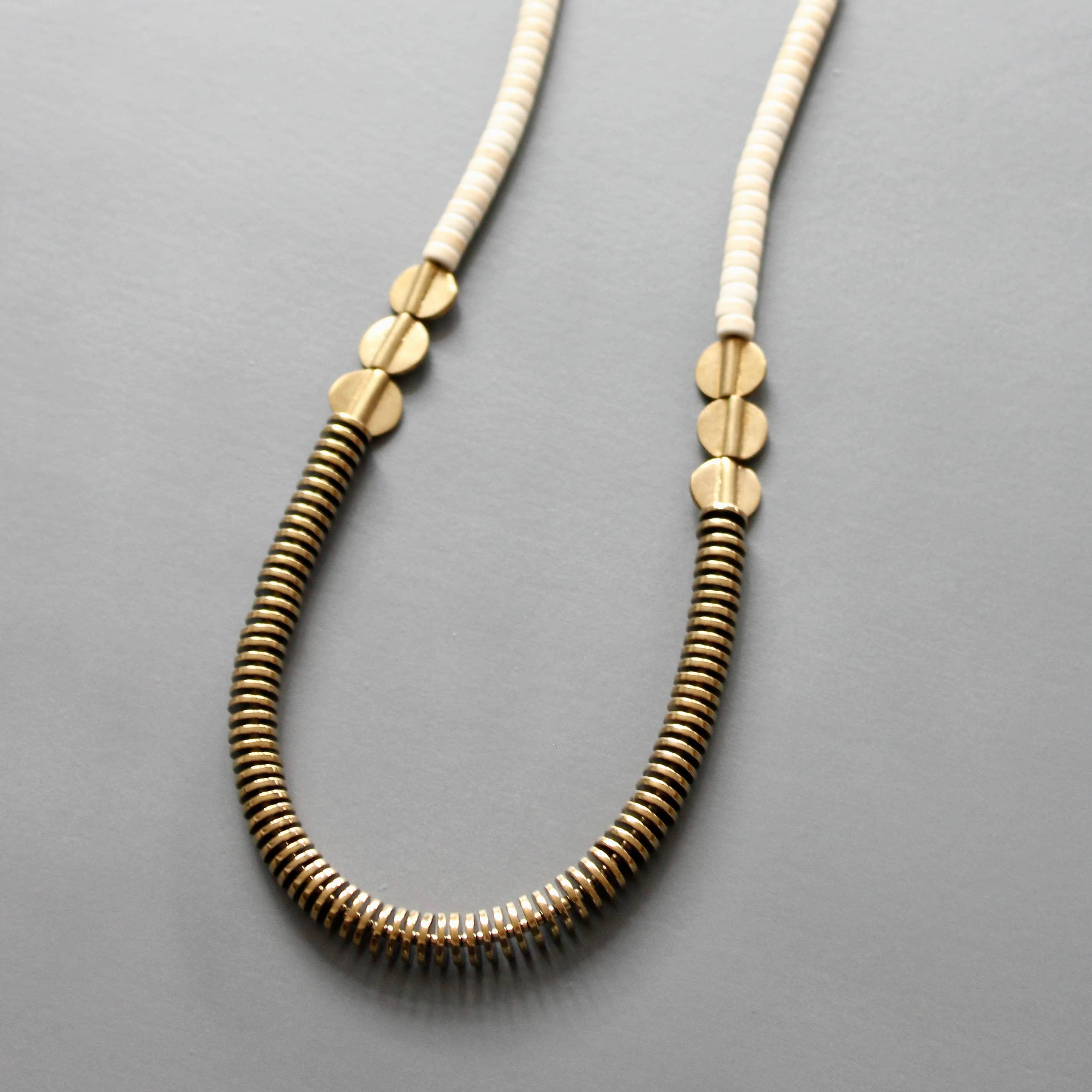 ISL126 Gold hematite and white disc necklace