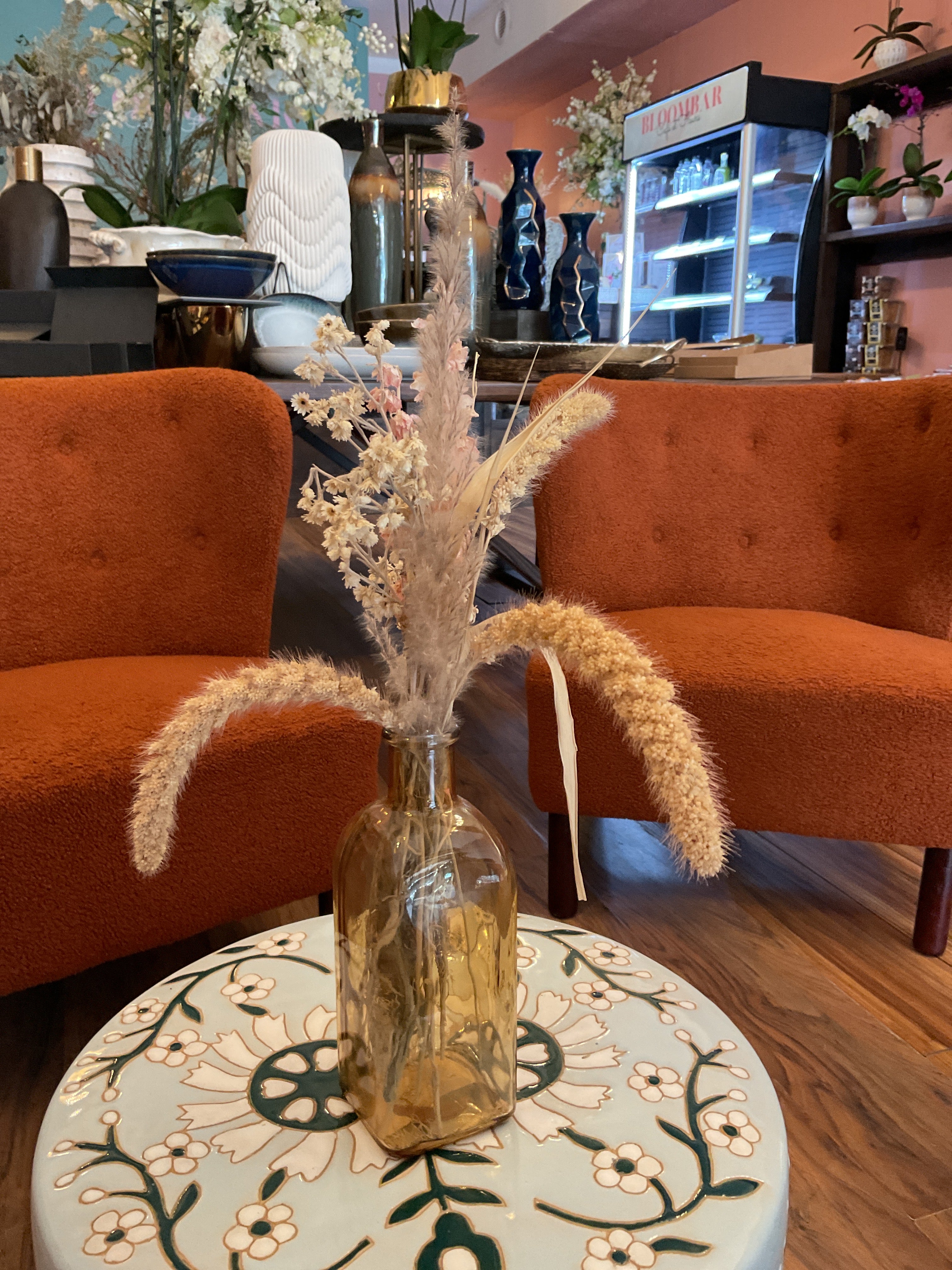 Dried Flowers in Amber Vase