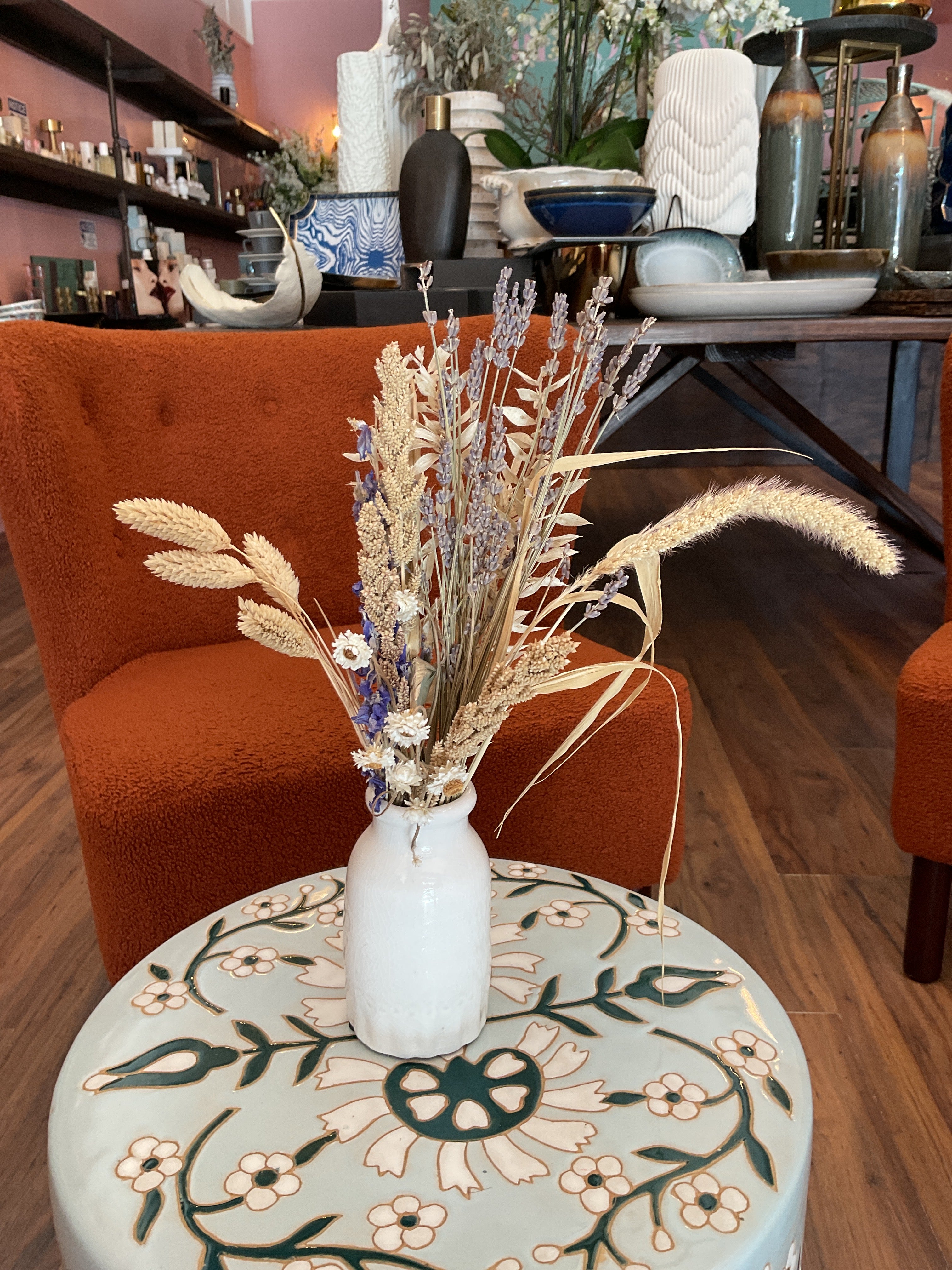 Dried Flowers in White Bud Vase