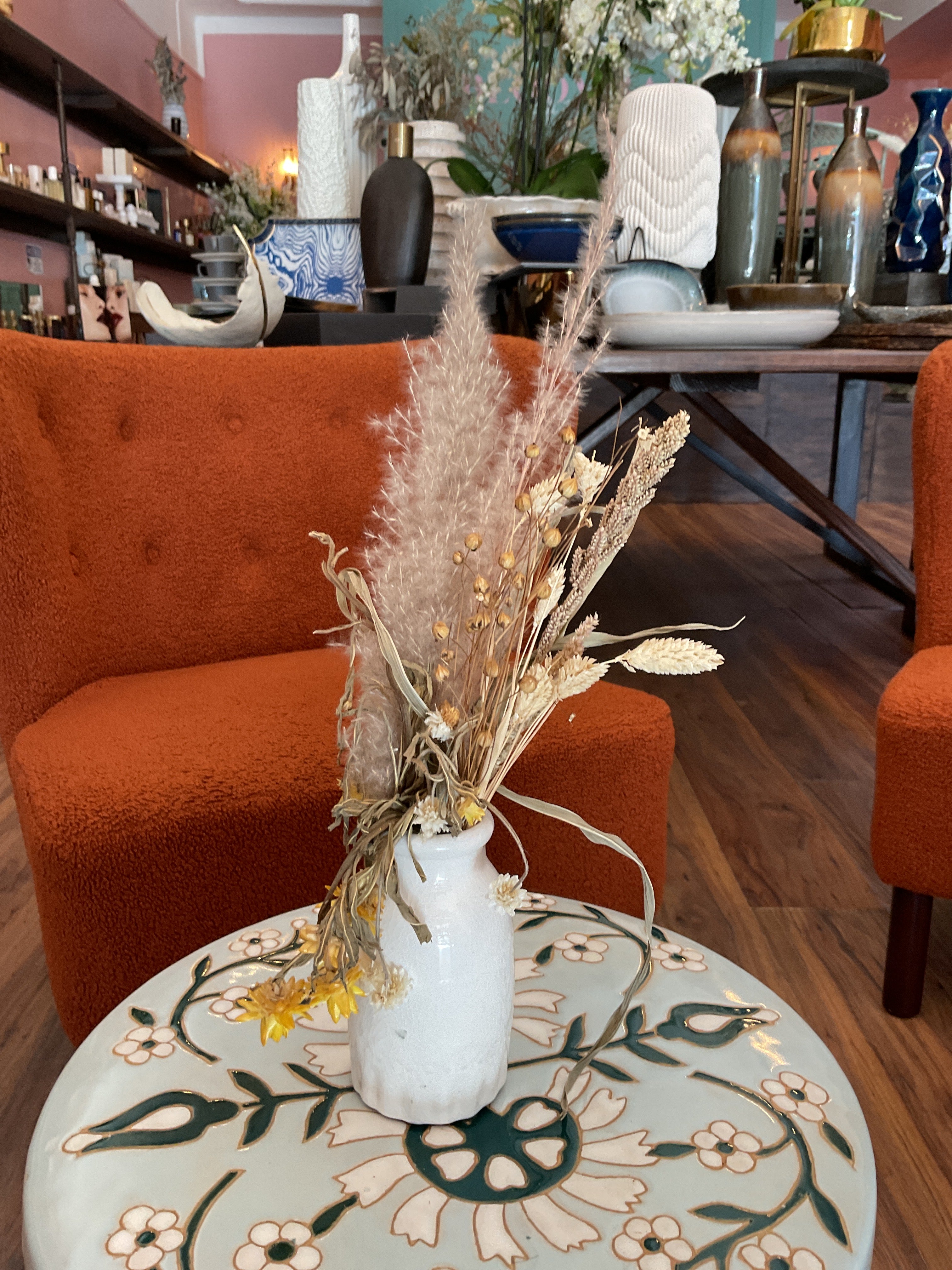 Dried Flowers in White Bud Vase