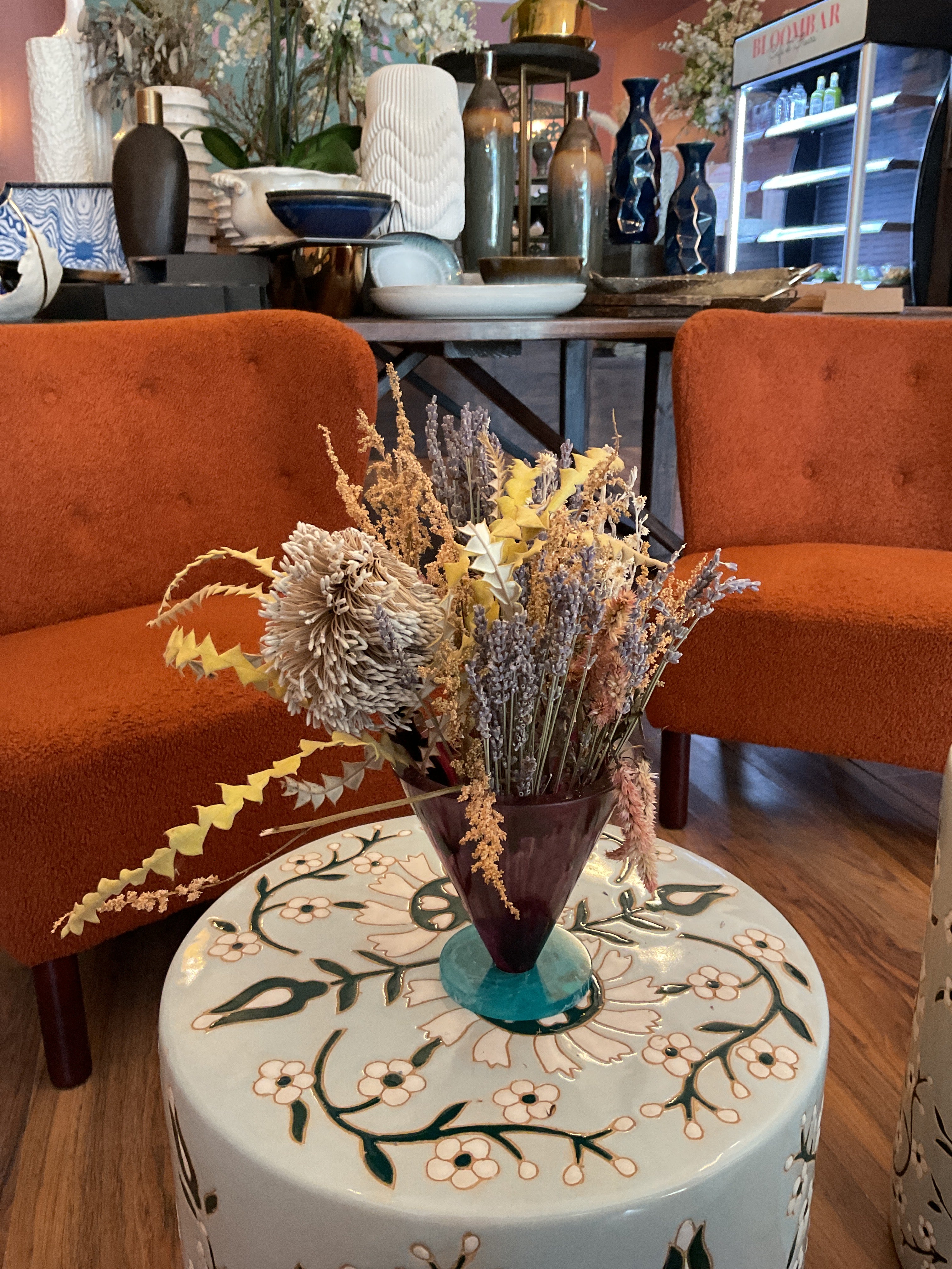 Dried Flowers in Purple Resin Vase