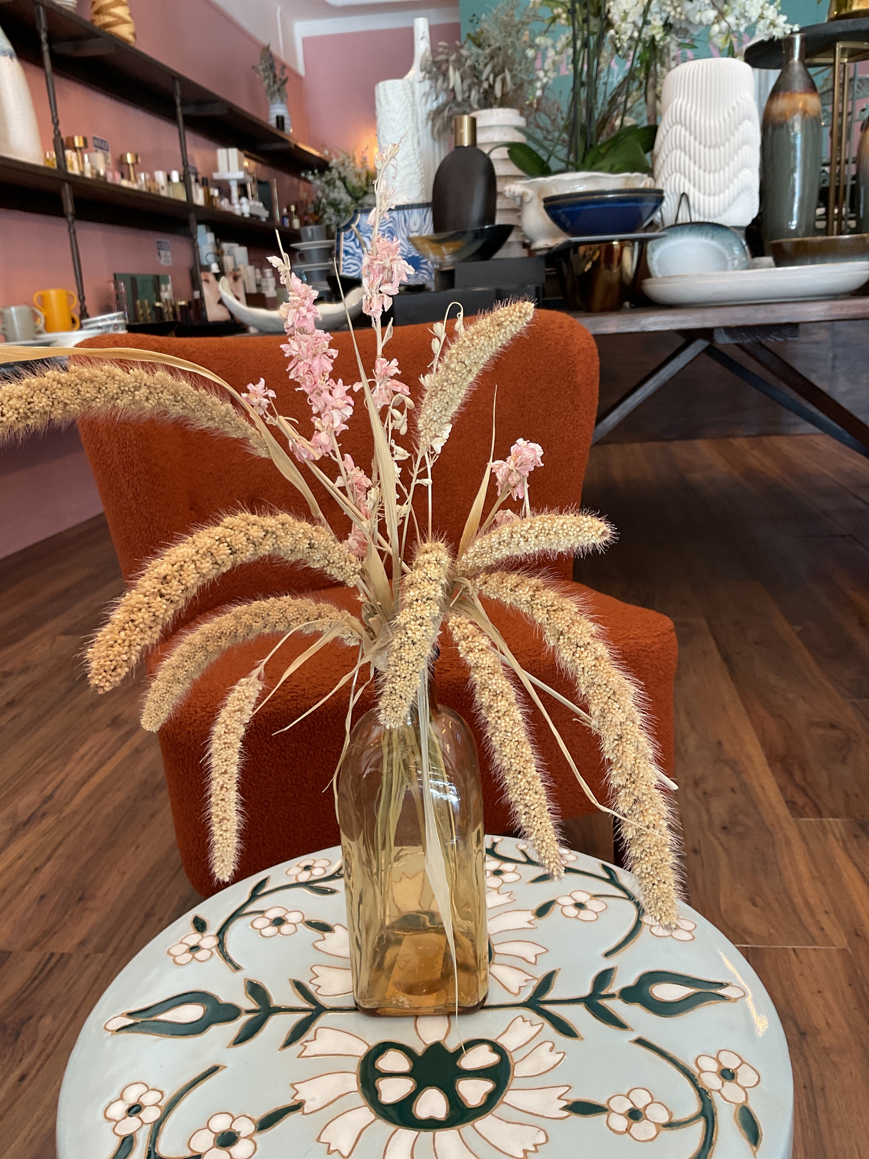 Dried Flowers in Amber Vase