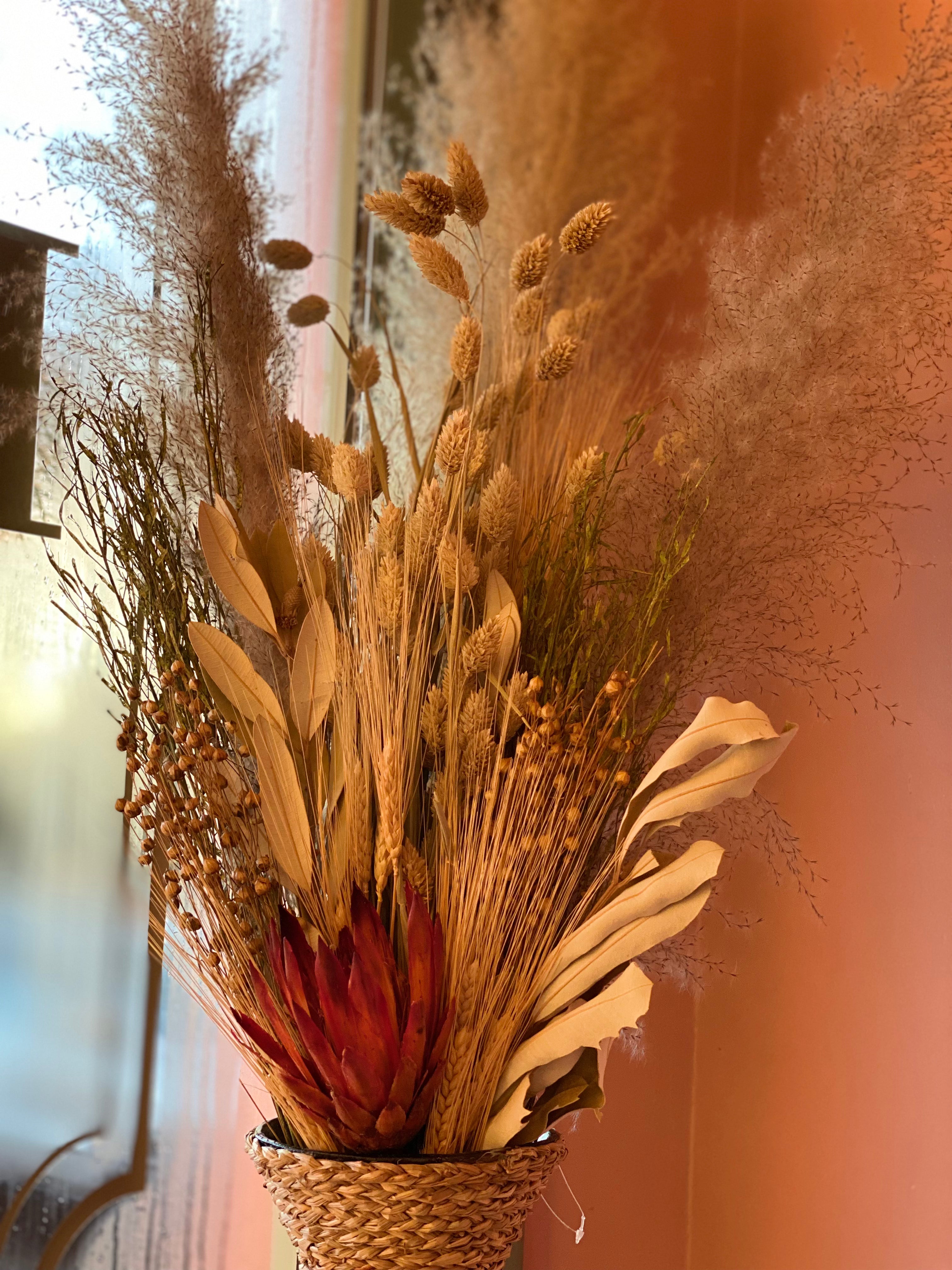 Dried Flowers in Rattan Vase