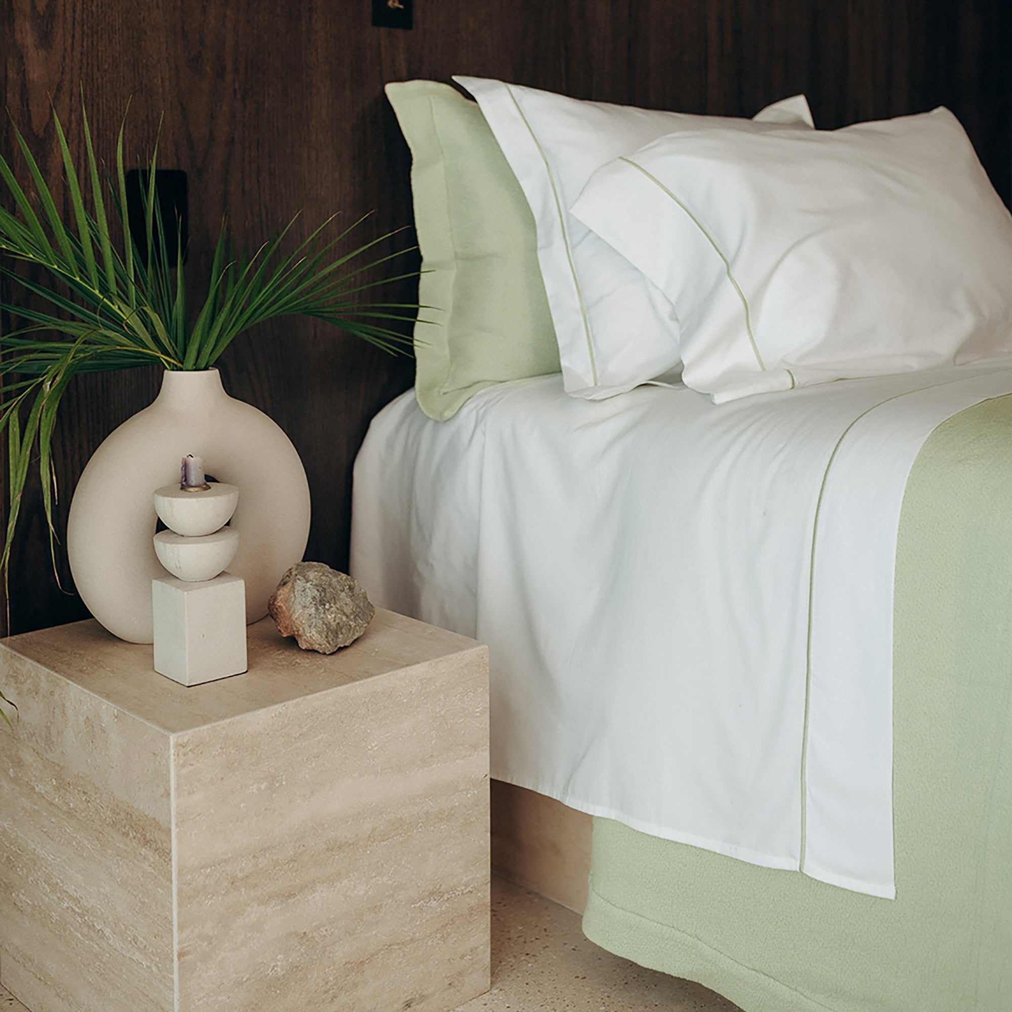 Serene Sheet Set by Rest & Reset styled with bedside decor, supporting a relaxed and restorative sleep space