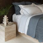 Serene Sheet Set by Rest & Reset styled on a fully made bed, designed for calm and consistent sleep quality