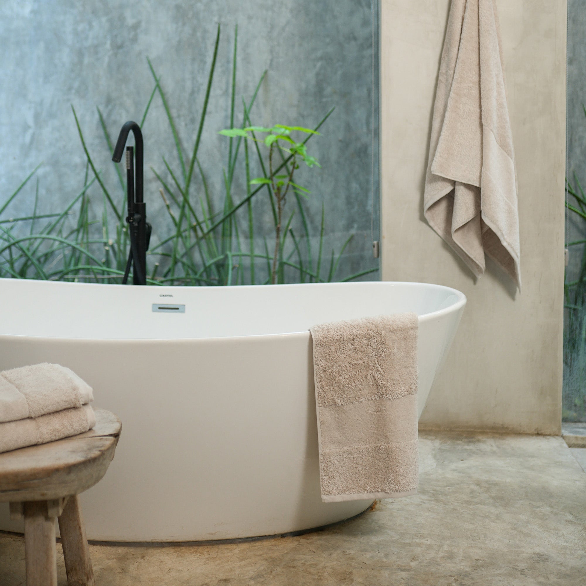 Ritual Bath Towel Set by Rest & Reset styled in natural light, highlighting texture and calming tones