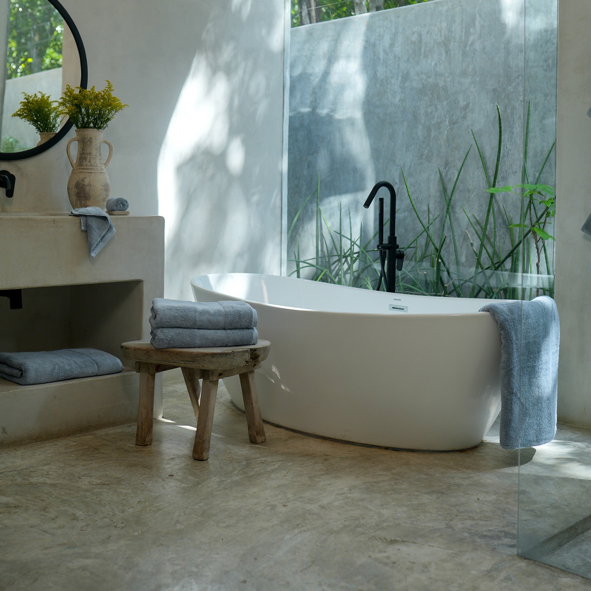 Ritual Bath Towel Set by Rest & Reset styled in a serene bathroom, creating a calm and elevated self-care environment