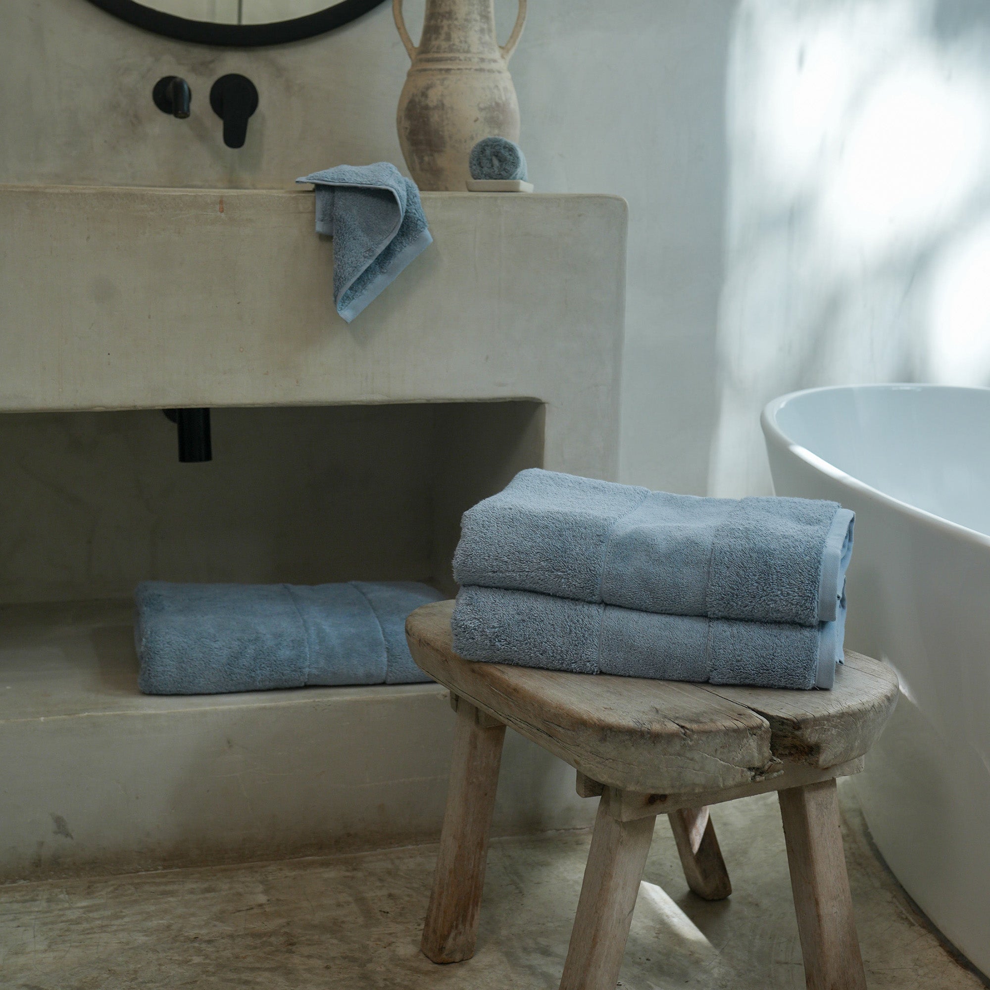 Ritual Bath Towel Set by Rest & Reset styled in a serene bathroom, creating a calm and elevated self-care environment
