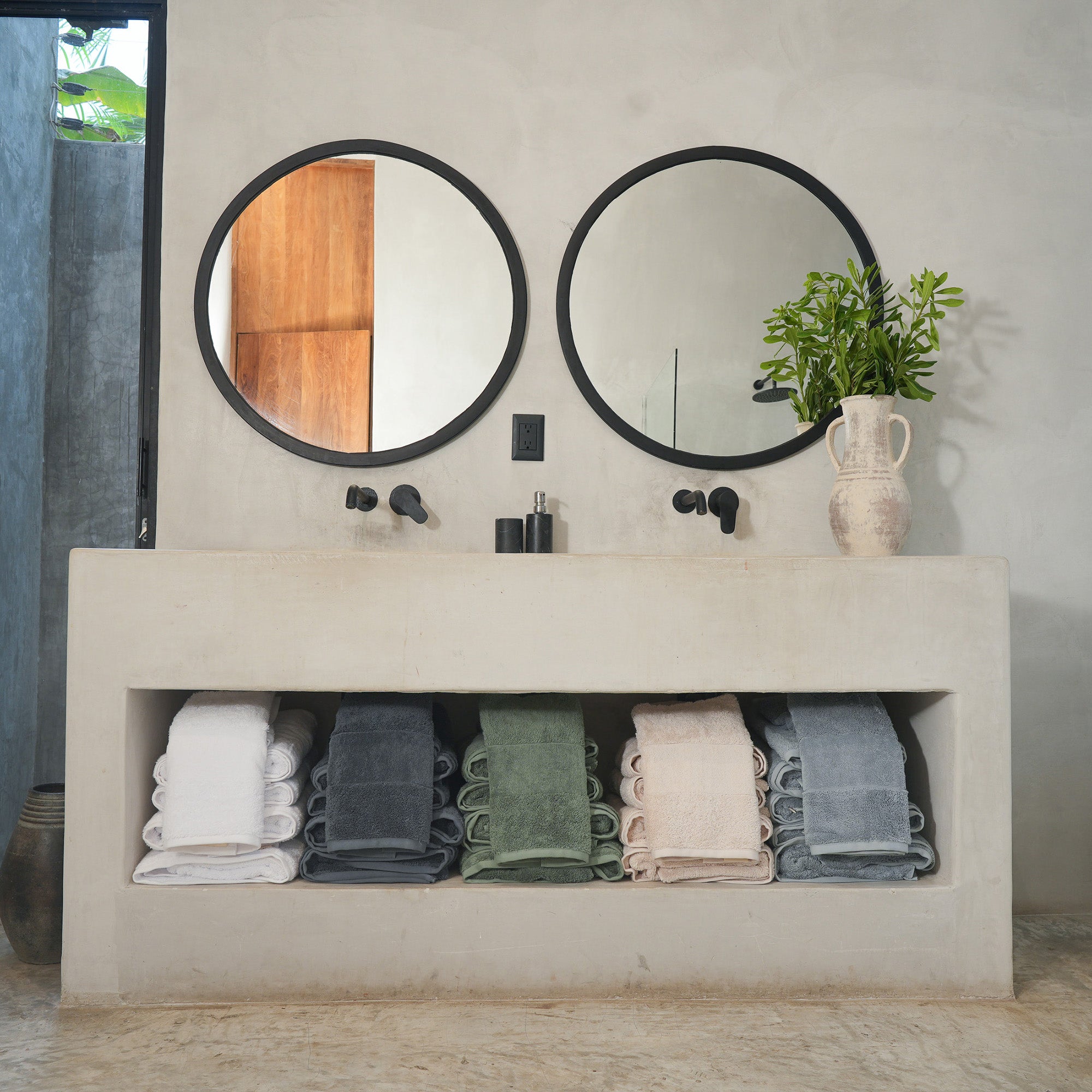 Ritual Bath Towel Set by Rest & Reset styled on open shelving, combining functionality with relaxed luxury