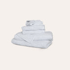 Ritual Bath Towel Set by Rest & Reset folded in a lighter shade, showcasing softness and clean finish