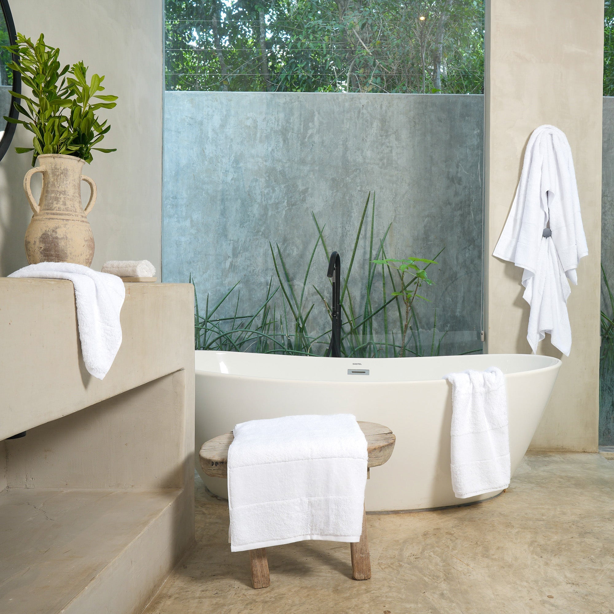 Ritual Bath Towel Set by Rest & Reset styled with natural elements, enhancing a fresh and calming bathroom feel