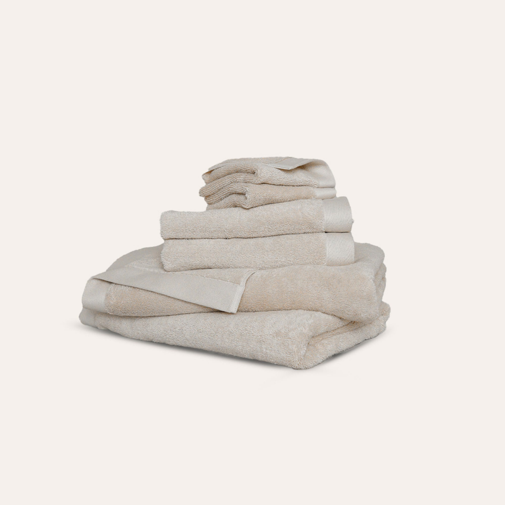 Oasis Bath Towel Set by Rest & Reset neatly folded, showcasing premium organic cotton and clean design