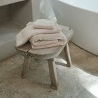 Oasis Bath Towel Set by Rest & Reset stacked neatly, emphasizing thickness, softness, and everyday usability