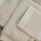Close-up of towel edge from the Oasis Bath Towel Set by Rest & Reset, showing clean finishing and durability