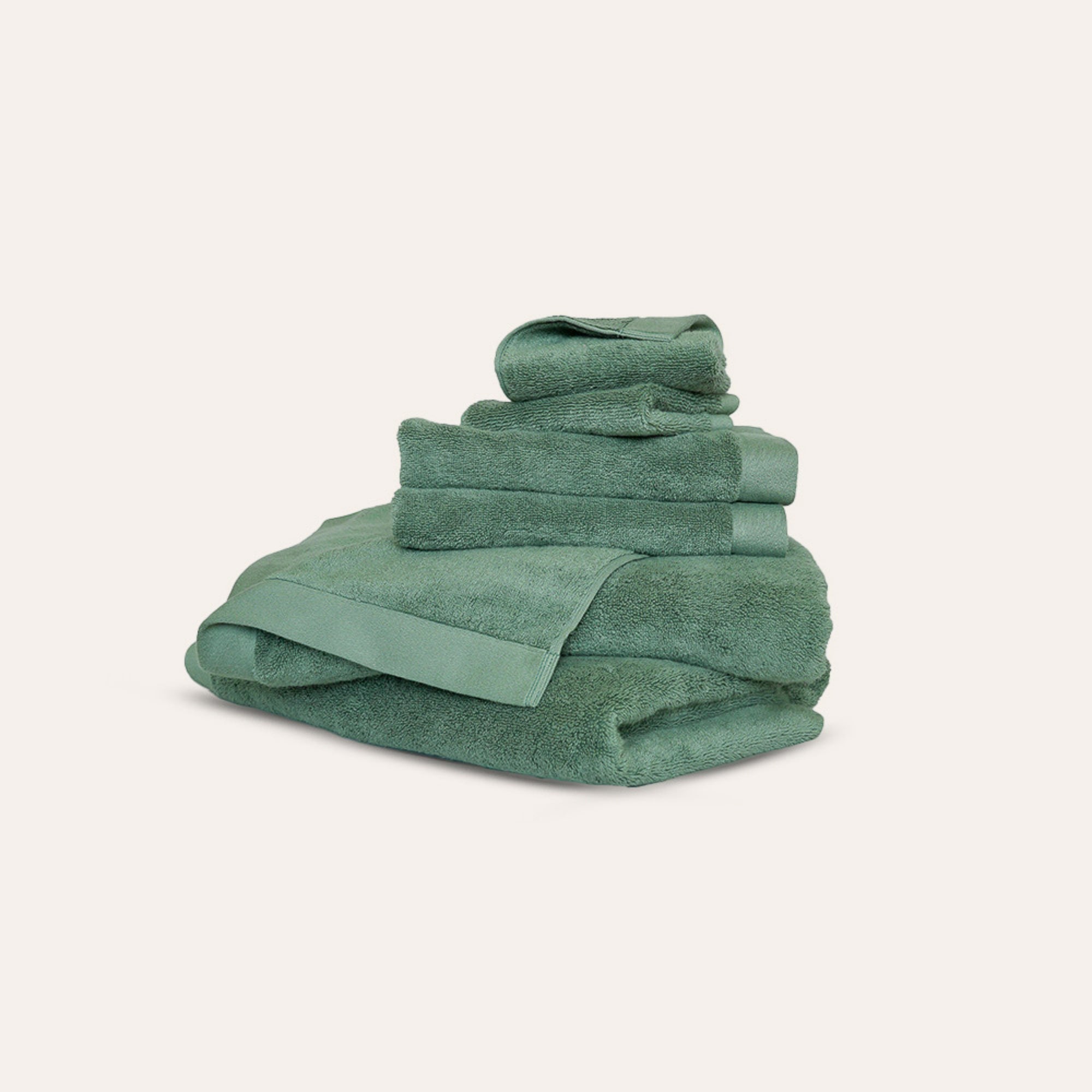 Oasis Bath Towel Set by Rest & Reset shown folded in an alternate color, maintaining a modern minimalist aesthetic