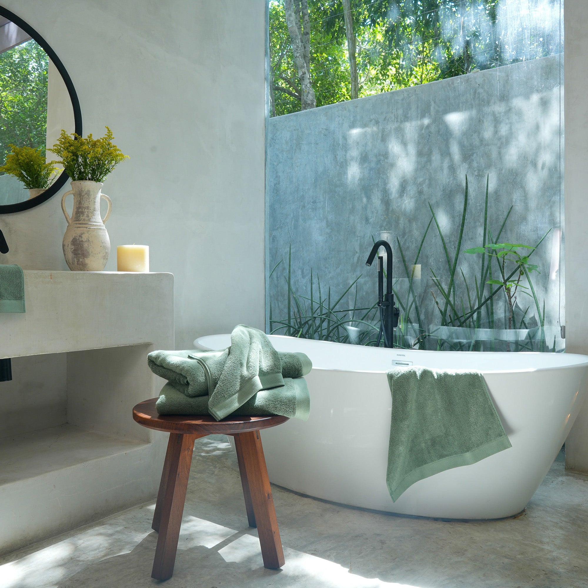 Oasis Bath Towel Set by Rest & Reset styled in natural light, highlighting texture and soothing tones