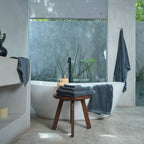 Oasis Bath Towel Set by Rest & Reset styled as part of a complete bathroom setup for everyday luxury