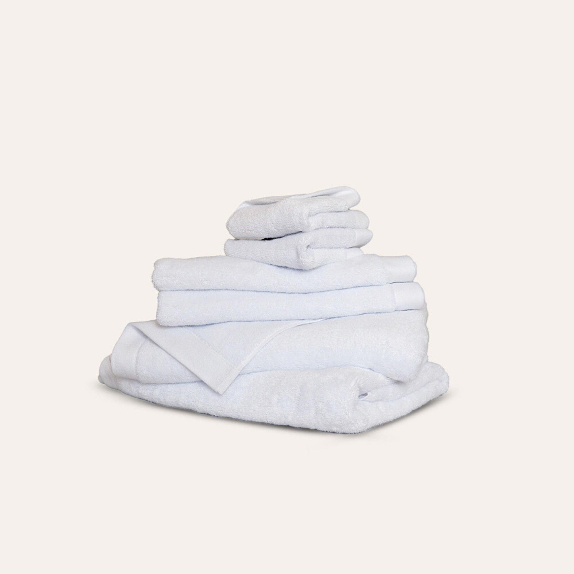 Oasis Bath Towel Set by Rest & Reset folded in a lighter shade, showcasing softness and refined finishing