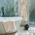Oasis Bath Towels Pair by Rest & Reset styled near the bath, supporting spa-like daily rituals