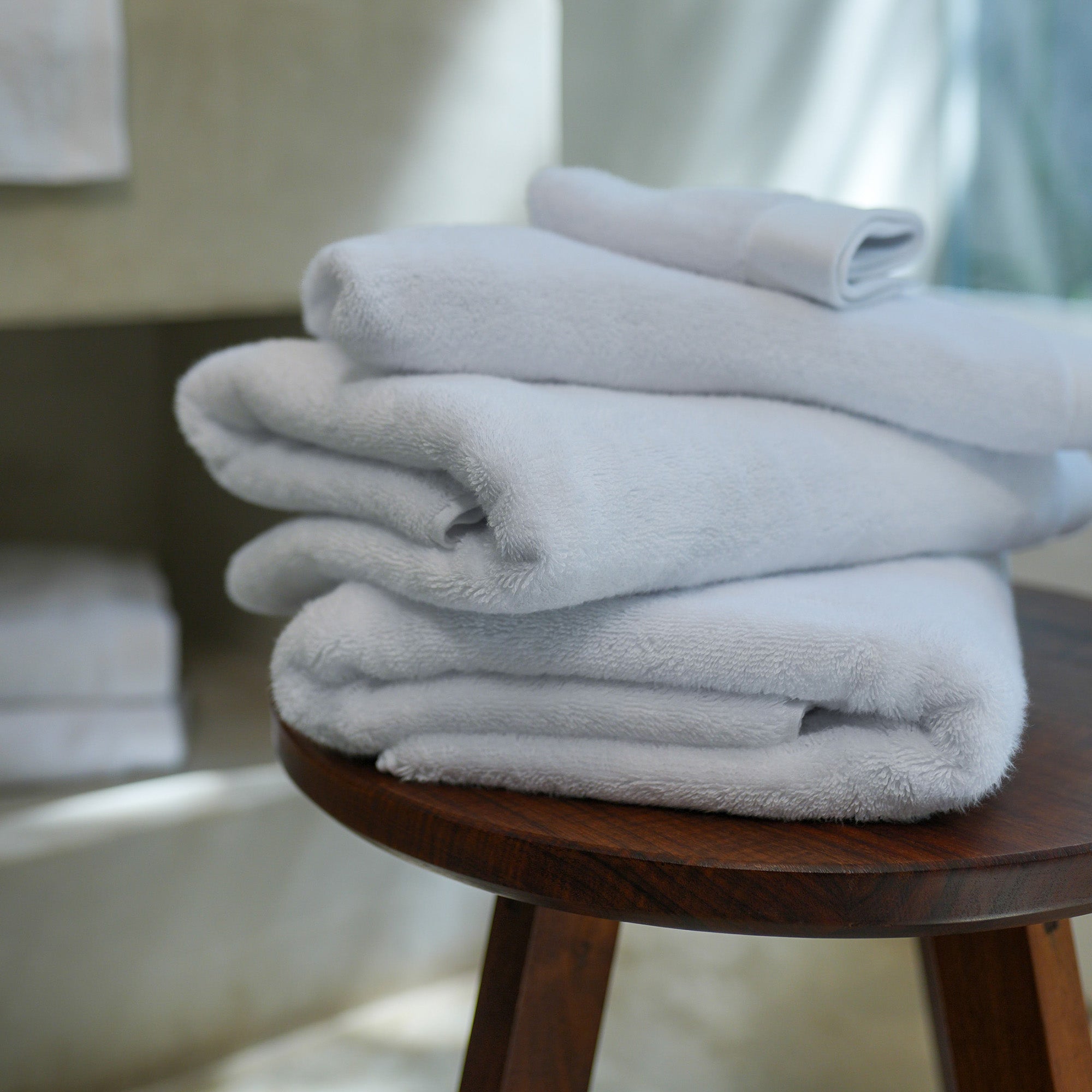 Oasis Bath Towels Pair by Rest & Reset displayed hanging as a coordinated towel set for daily use