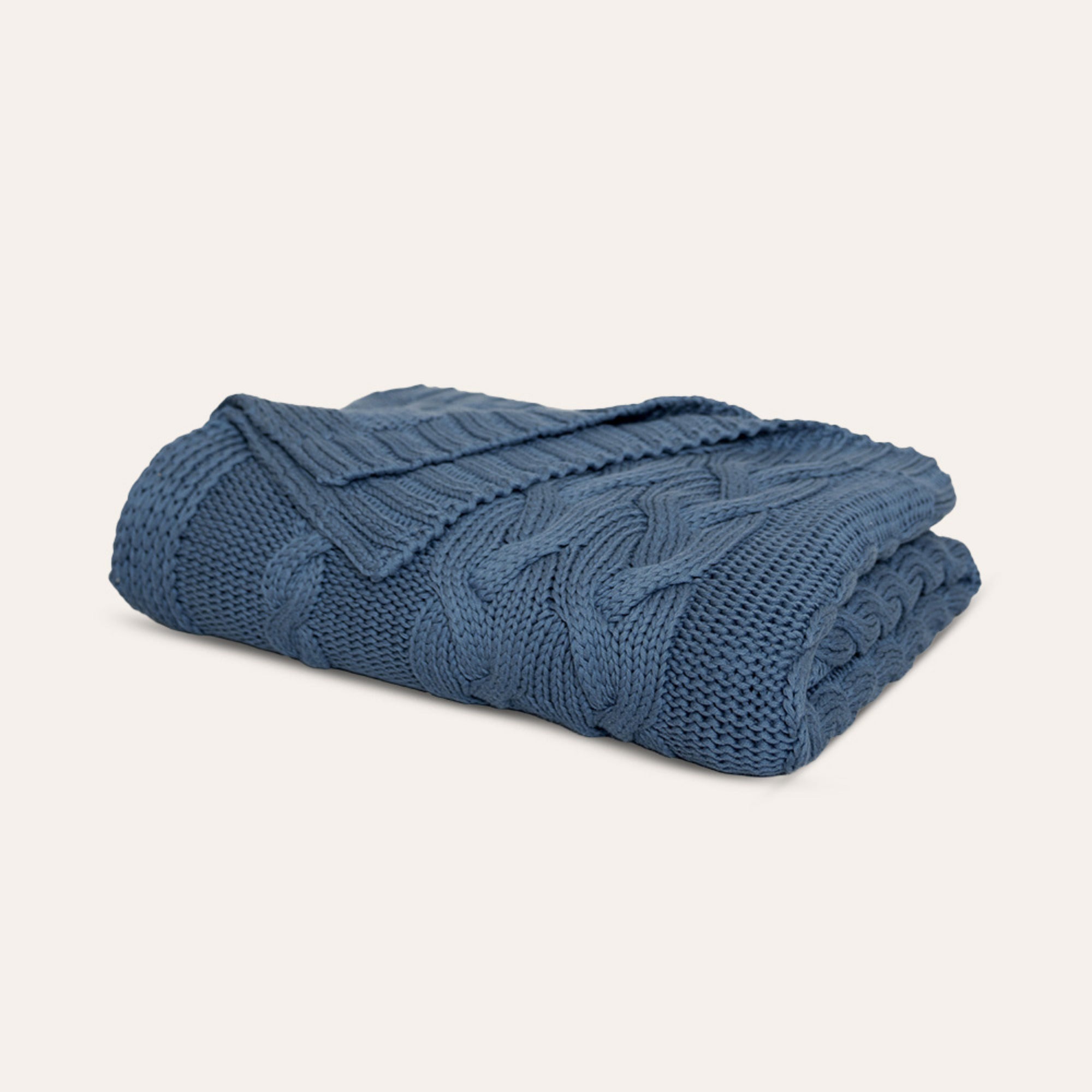Drift Throw Blanket by Rest & Reset neatly folded in an alternate tone, showcasing organic cotton texture