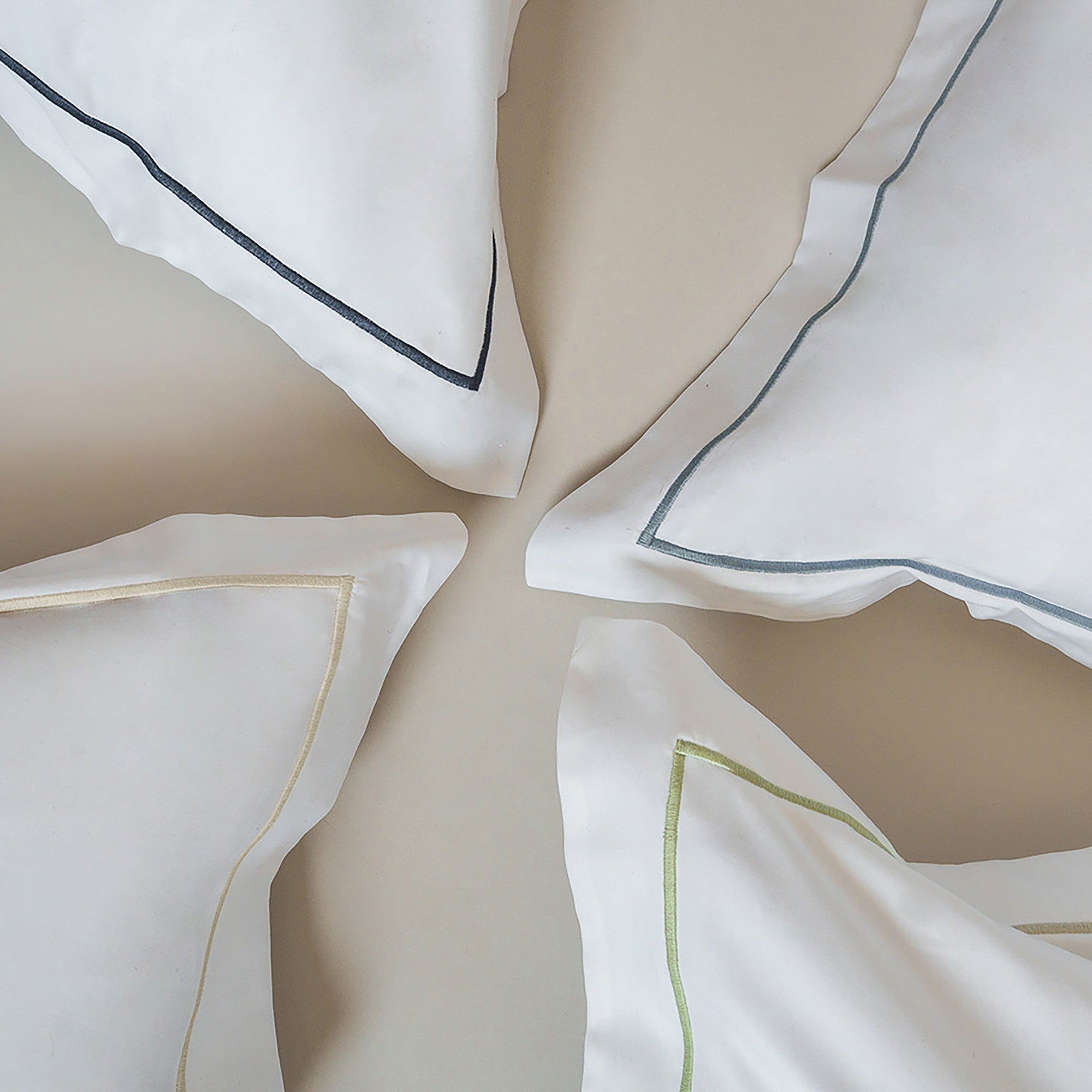Close-up of stitching on the Serene Duvet Cover Set by Rest & Reset, emphasizing quality craftsmanship