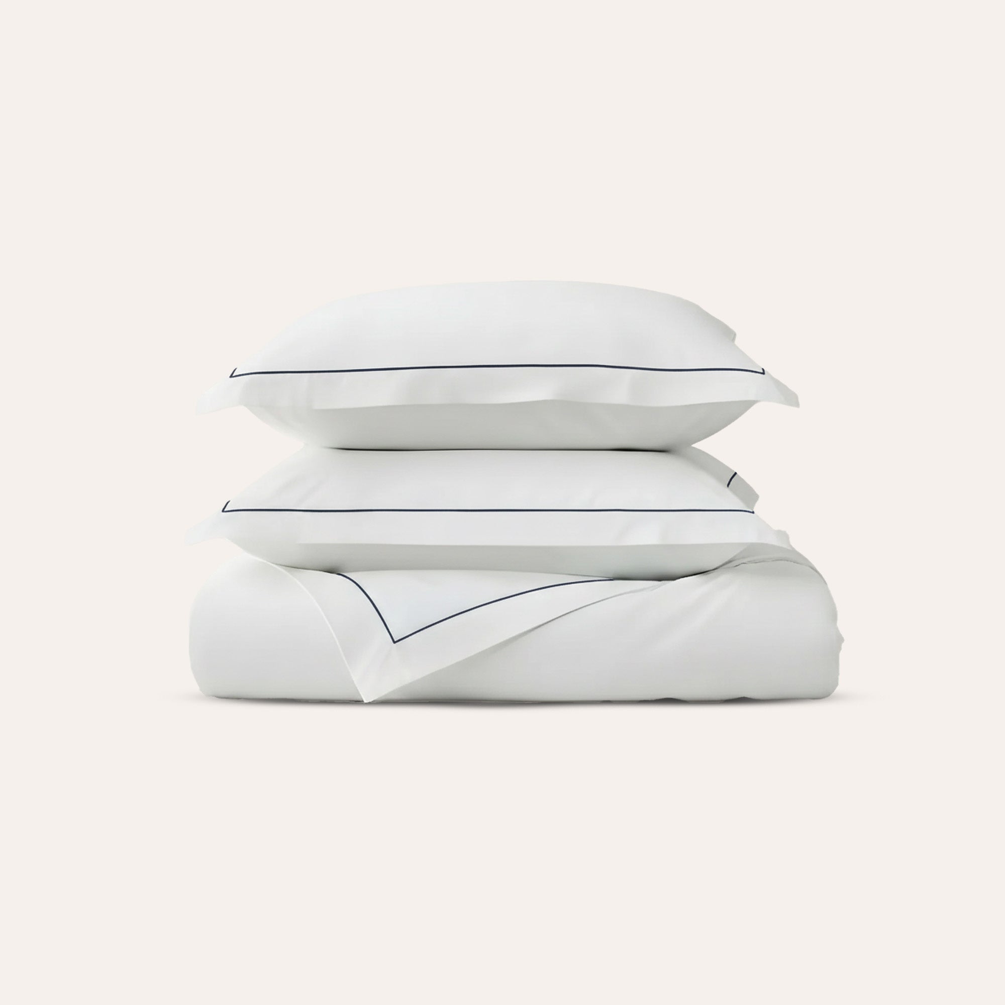Serene Duvet Cover Set by Rest & Reset folded neatly, emphasizing simplicity and softness