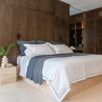 Serene Duvet Cover Set by Rest & Reset styled on a fully made bed, designed for consistent comfort and calm sleep